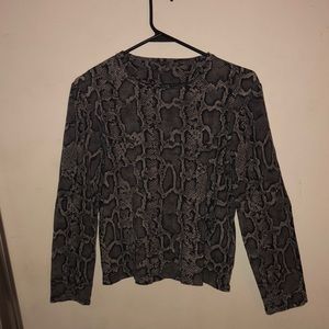 Long sleeved snake print top